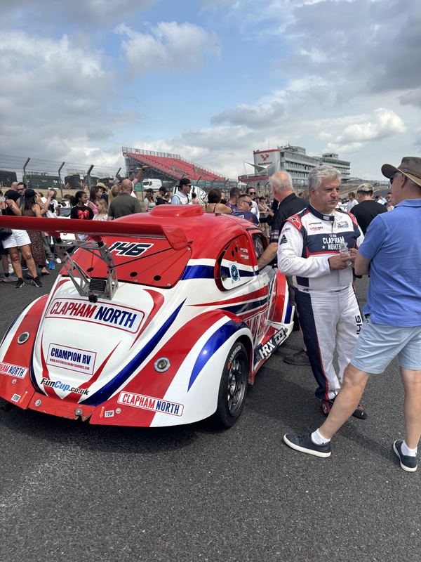 Front of Car 146 on the grid with guests walking past