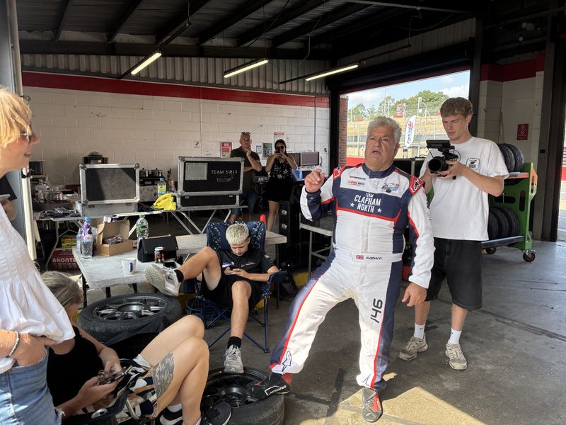 George Grant and the team relaxing in the garage